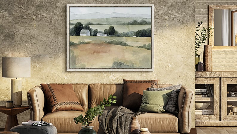 Farmhouse art hanging above leather couch linking to farmhouse art products